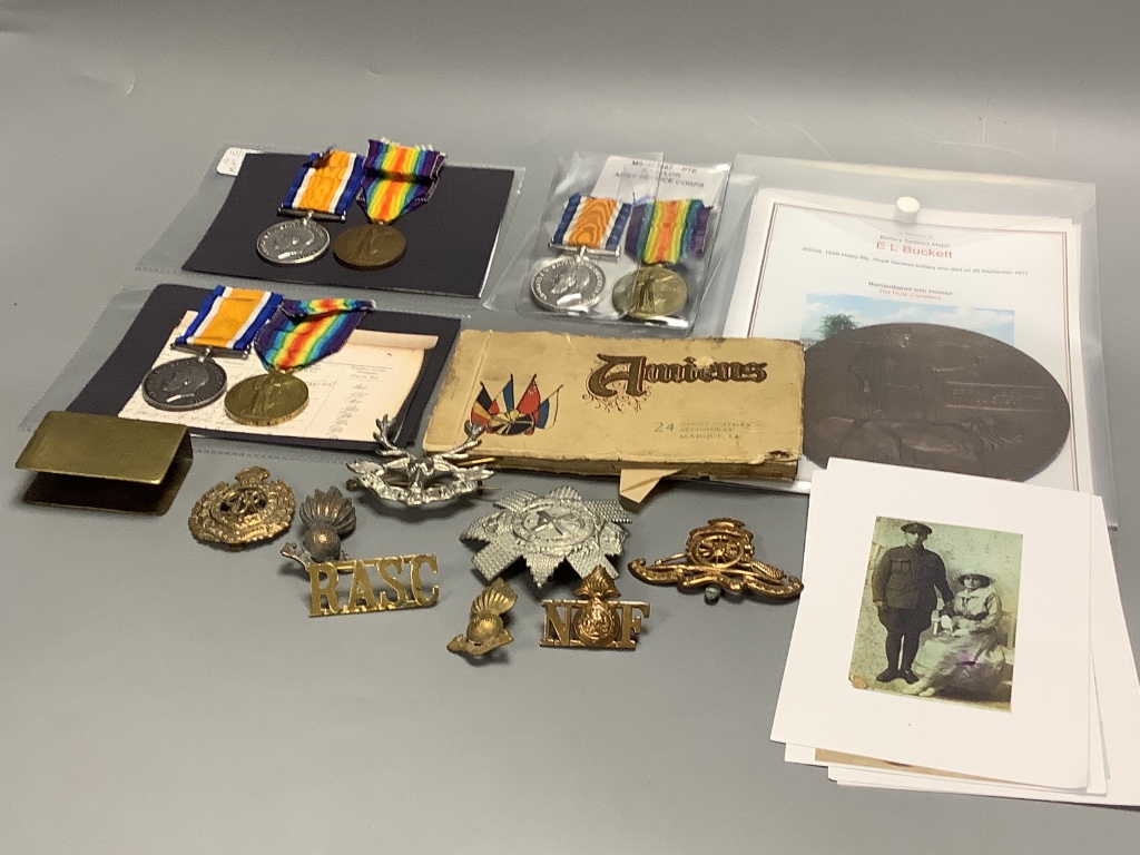 A group of assorted WW1 medals and badges etc